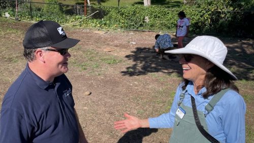 Parks & Rec Director Andy Field talks with Master Gardener Julia Ruener Guerrero.